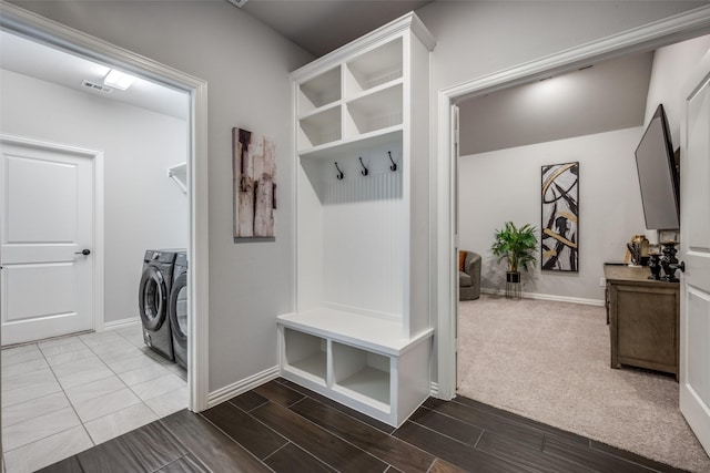 mudroom with washer and dryer