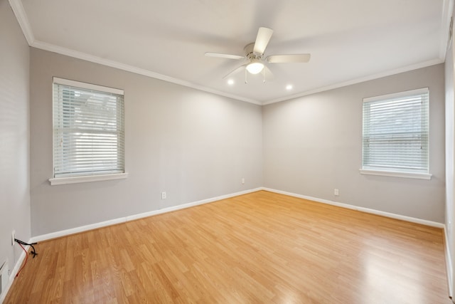 unfurnished room featuring light wood-type flooring, ceiling fan, and crown molding