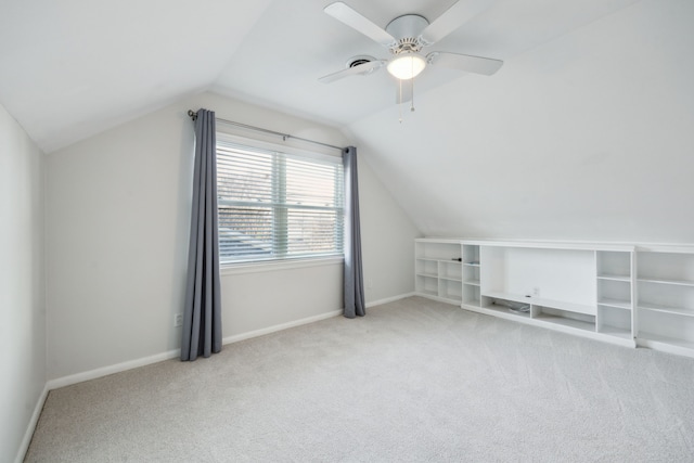 bonus room featuring carpet floors, ceiling fan, and vaulted ceiling