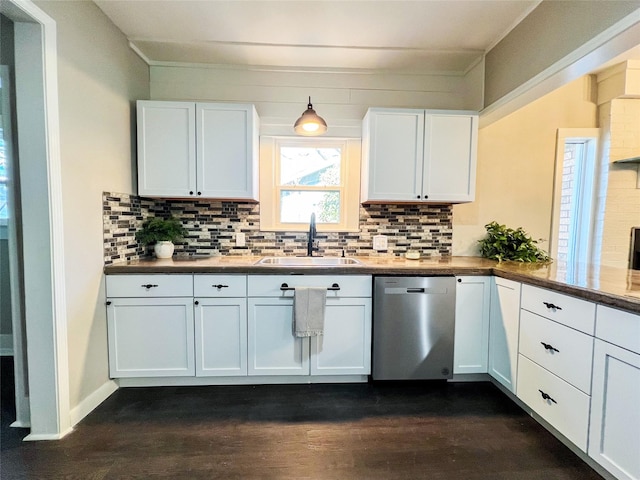 kitchen with sink, white cabinetry, and dishwasher