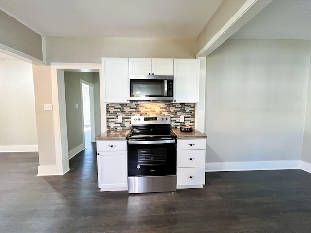 kitchen featuring tasteful backsplash, appliances with stainless steel finishes, dark hardwood / wood-style flooring, and white cabinetry