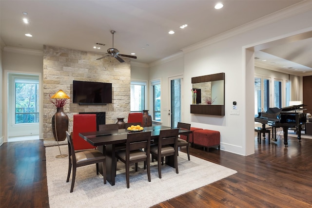 dining room featuring ceiling fan, hardwood / wood-style floors, crown molding, and plenty of natural light