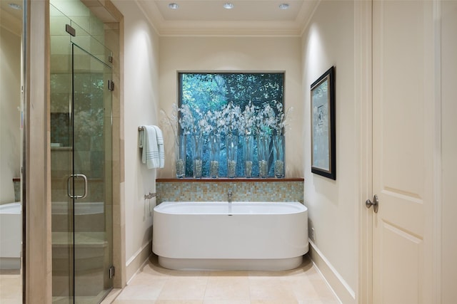 33 Glen Abbey Dr, Dallas, TX 75248 - full bathroom with a stall shower, a freestanding tub, ornamental molding, baseboards, and tile patterned flooring