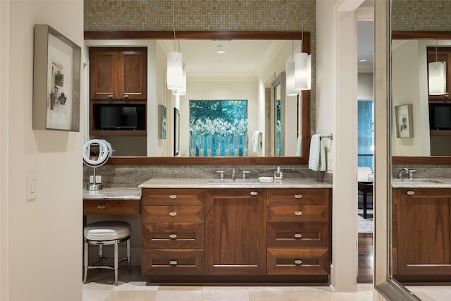 33 Glen Abbey Dr, Dallas, TX 75248 - bathroom with vanity and crown molding