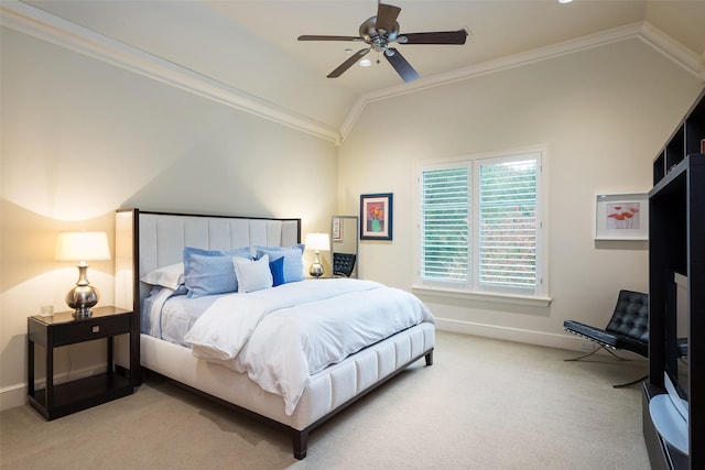 bedroom featuring carpet floors, ceiling fan, vaulted ceiling, and crown molding