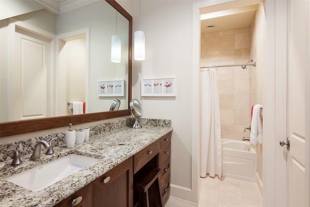 bathroom with vanity, tile patterned flooring, and shower / bath combo with shower curtain