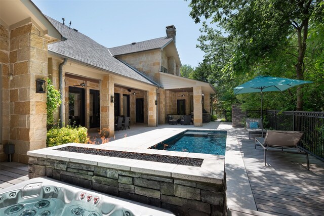 33 Glen Abbey Dr, Dallas, TX 75248 - view of pool with a patio area, an outdoor living space with a fire pit, and an outdoor hot tub