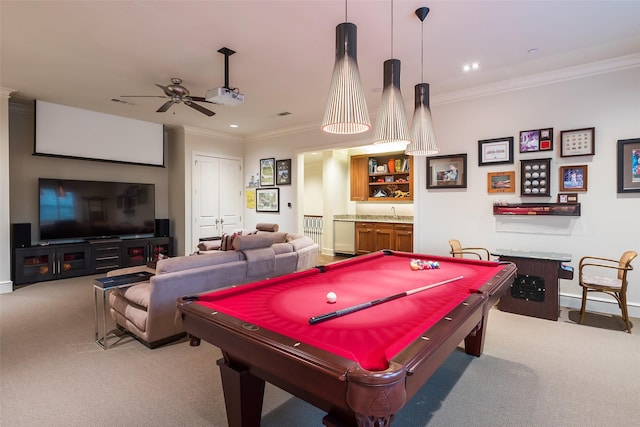 recreation room with pool table, light colored carpet, ceiling fan, and crown molding