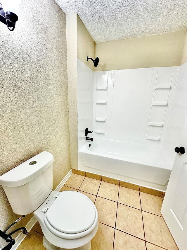 bathroom with toilet, tile patterned floors, and shower / bath combination