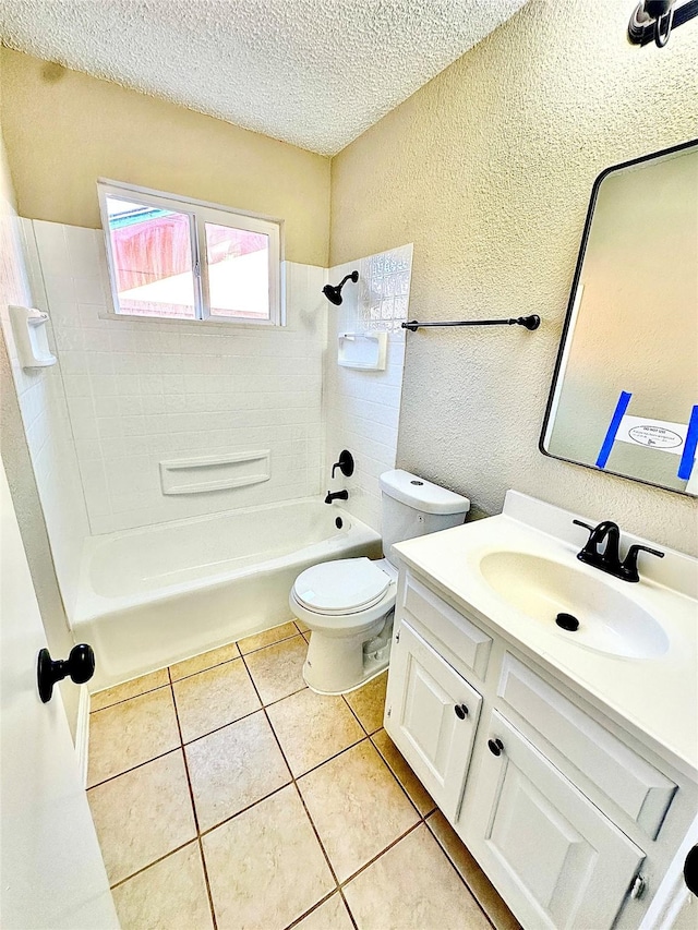 full bathroom with toilet, a textured ceiling, tile patterned floors, tiled shower / bath combo, and vanity