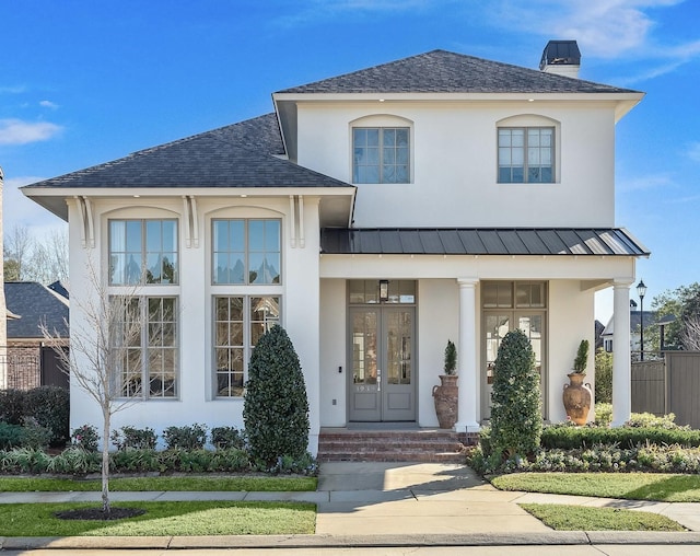 view of front of property featuring french doors and a porch