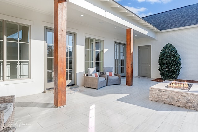 view of patio / terrace with a fire pit