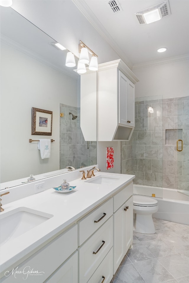 full bathroom featuring toilet, vanity, enclosed tub / shower combo, and ornamental molding