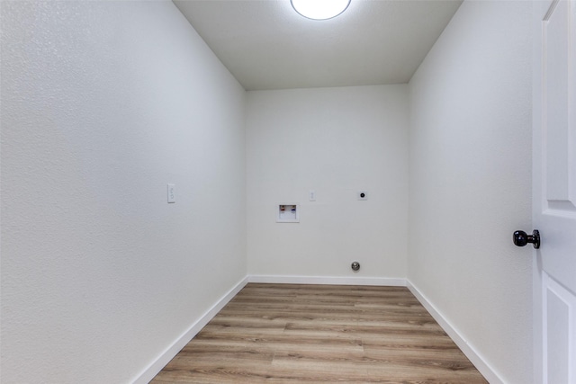 laundry room with laundry area, washer hookup, baseboards, light wood-style floors, and electric dryer hookup