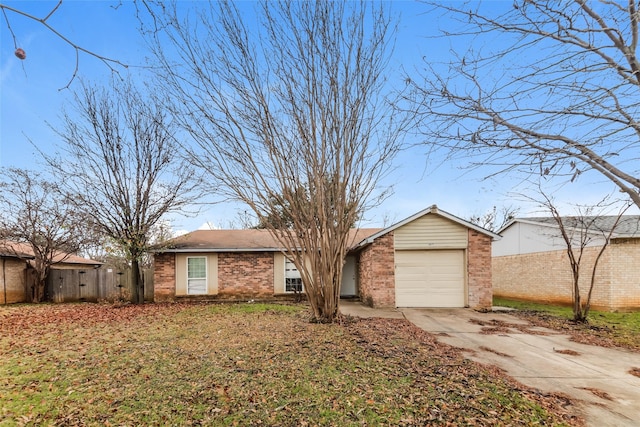 ranch-style house featuring a garage