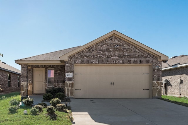 ranch-style house featuring a garage