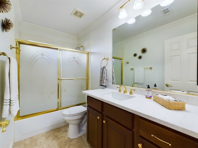 full bathroom featuring vanity, shower / bath combination with glass door, toilet, and crown molding