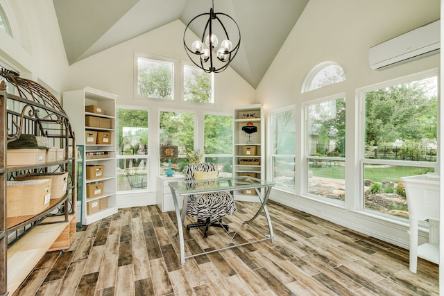 interior space with a chandelier and a wall mounted AC