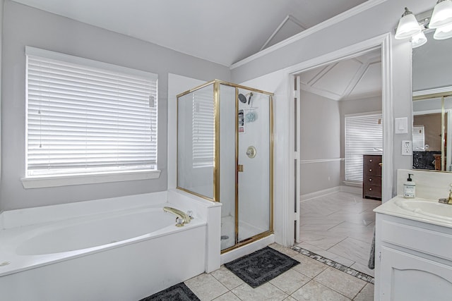 bathroom featuring plus walk in shower, tile patterned floors, lofted ceiling, and vanity