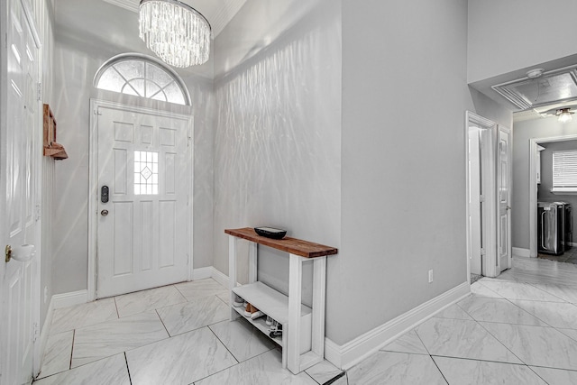 entrance foyer with an inviting chandelier