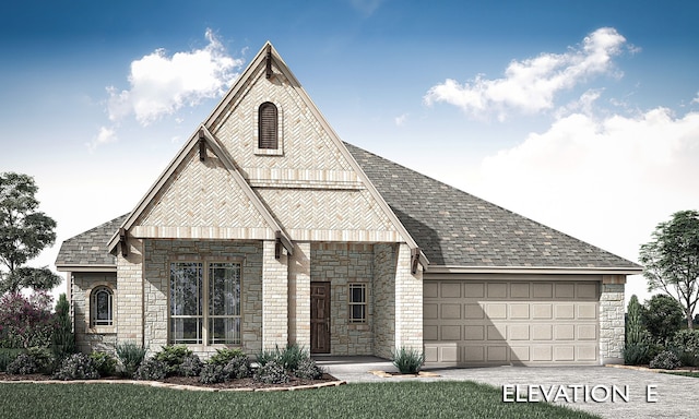 view of front of house with a front lawn and a garage