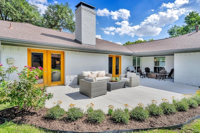 back of property featuring a patio area, french doors, and outdoor lounge area