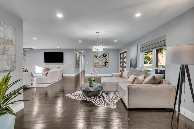 living room with dark hardwood / wood-style floors