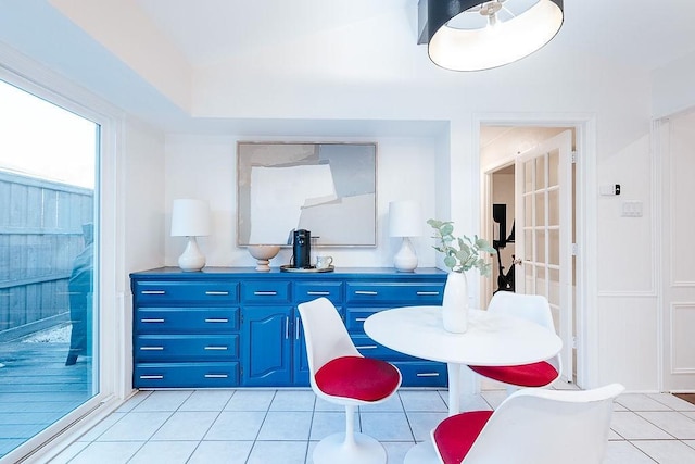 dining room with light tile patterned flooring