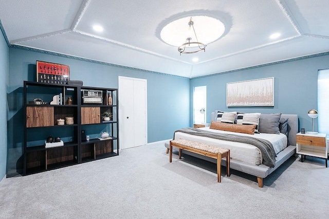 bedroom with lofted ceiling and carpet