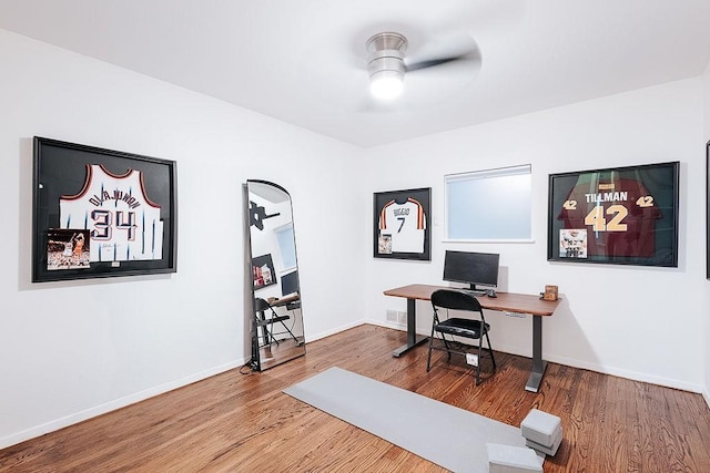 office space featuring ceiling fan and hardwood / wood-style floors