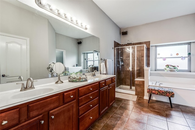 bathroom with separate shower and tub and vanity