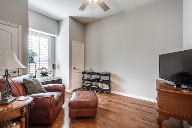 sitting room featuring ceiling fan and wood-type flooring