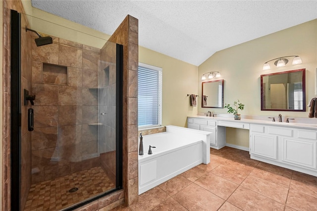 bathroom with a textured ceiling, tile patterned flooring, vaulted ceiling, and shower with separate bathtub