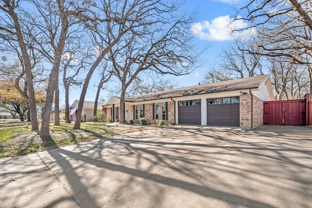 ranch-style house featuring a garage