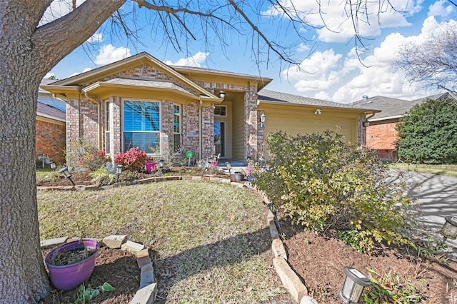 view of front of property featuring a garage and a front lawn