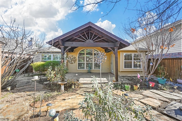 view of front of house with a patio area