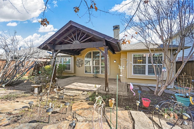 back of property featuring a patio area