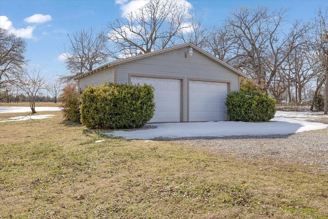 garage with a lawn