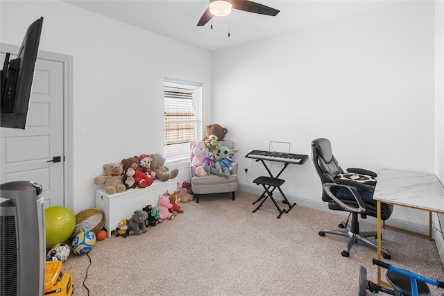 office area featuring ceiling fan and carpet floors