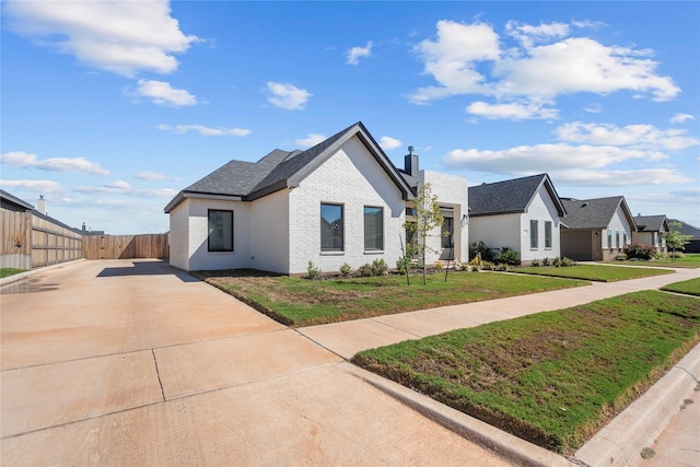 view of front of home with a front yard