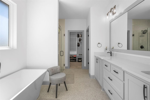 bathroom featuring vanity, tile patterned flooring, and independent shower and bath