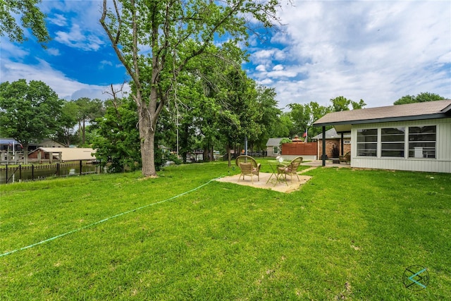 view of yard with a patio area