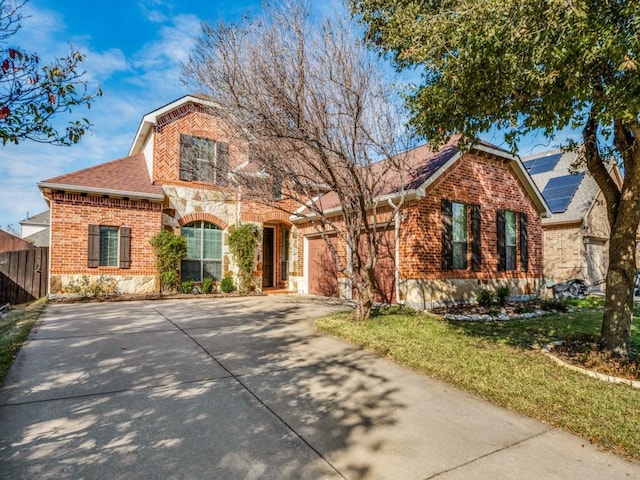 front facade with a front yard