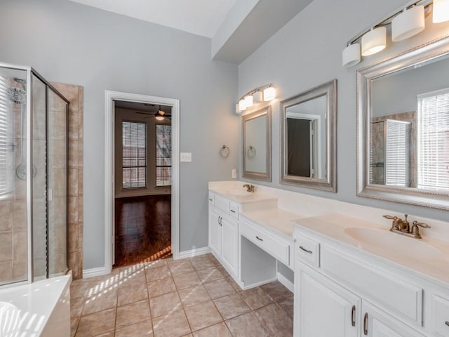 bathroom featuring an enclosed shower, ceiling fan, tile patterned floors, and vanity