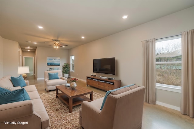 living room featuring ceiling fan