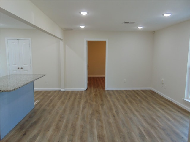 interior space with dark hardwood / wood-style flooring