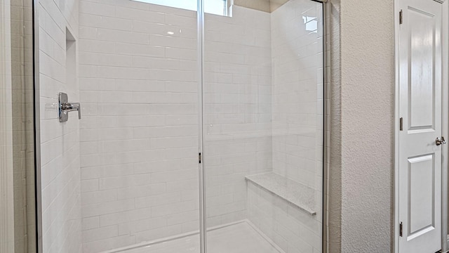 bathroom with walk in shower