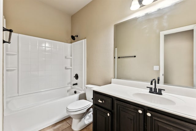 full bathroom featuring toilet, vanity, tile patterned flooring, and  shower combination