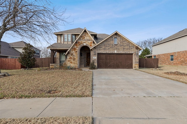 view of front of property featuring a garage