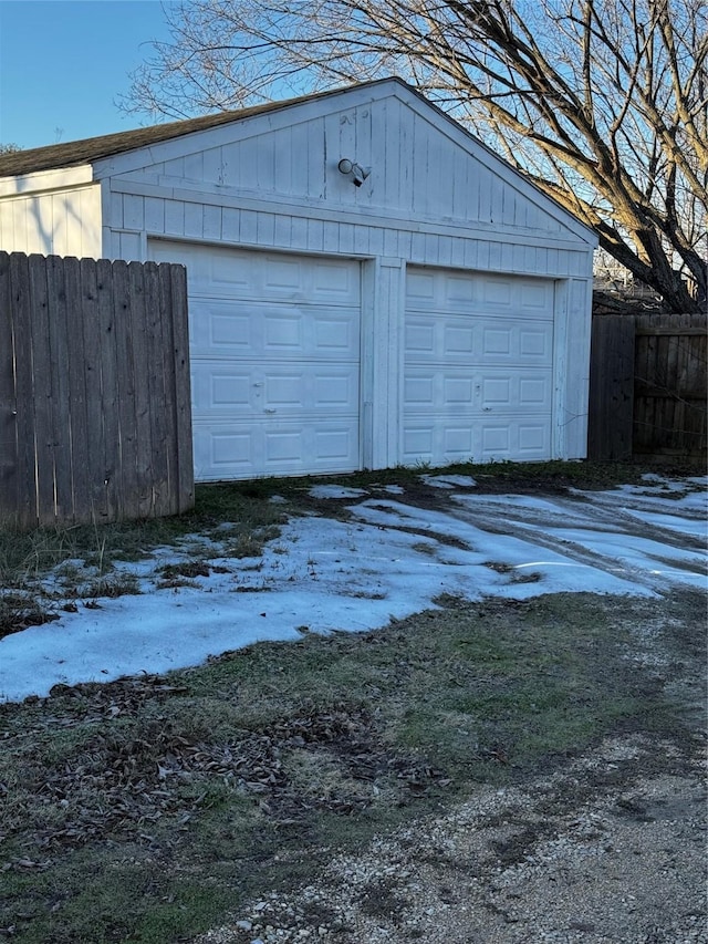 view of snow covered garage